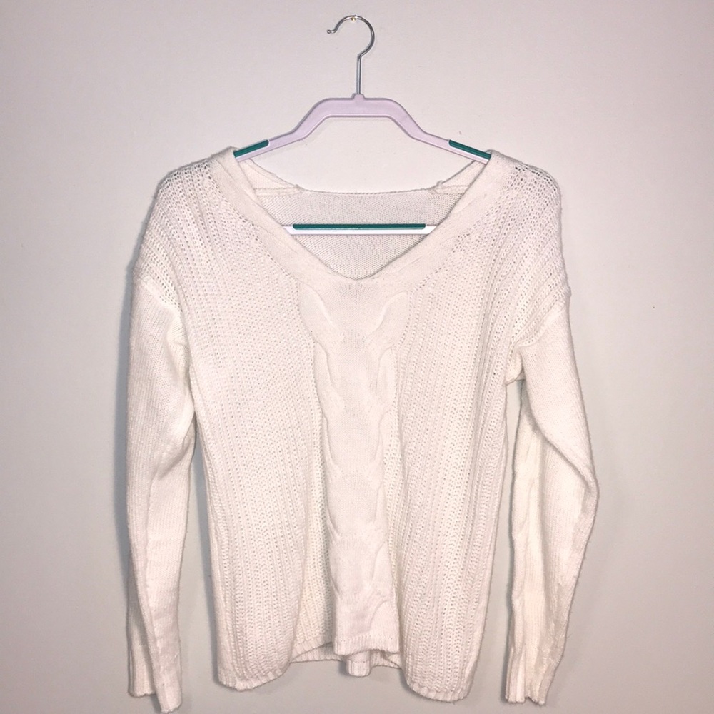 White sweater, V-neck